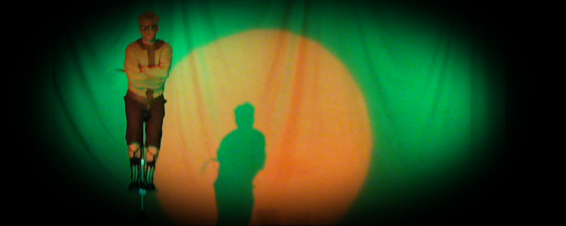 [Shay Horay bounces on a pogo stick in Heavenly Burlesque - The Untamed Oddities Tour 08]