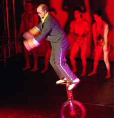 Kim Potter on the giraffe unicycle 